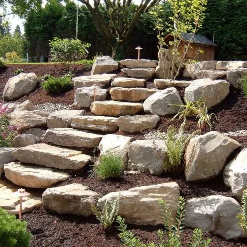 Hardscaped patio and paved surfaces in a finished backyard